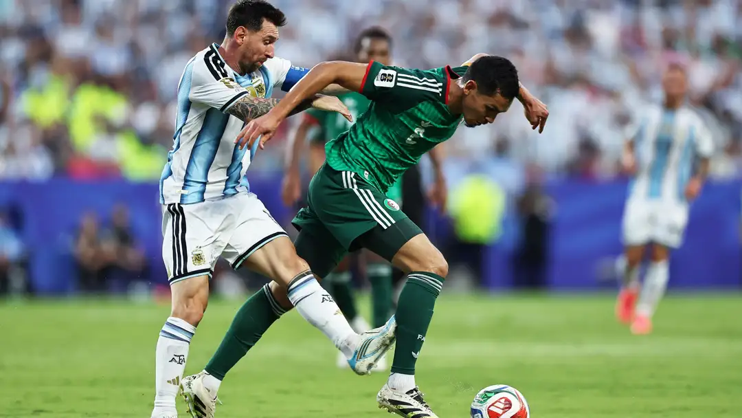 Algeria complains to FIFA about referee's call on Messi's tackle
